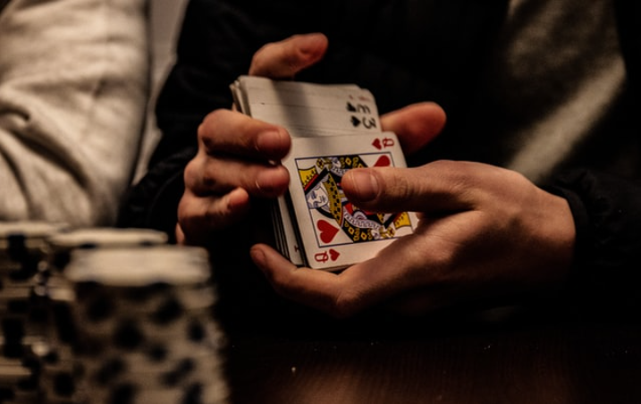 A person shuffling cards